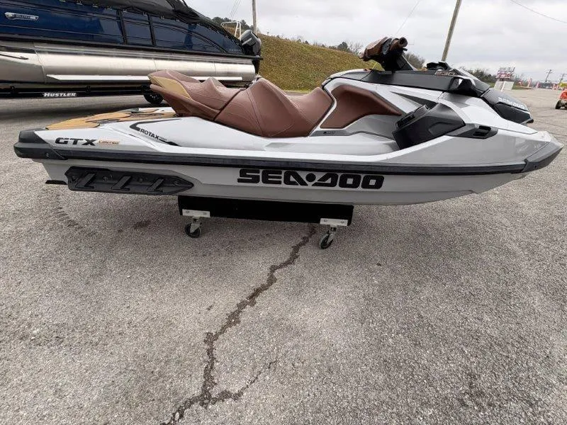 Slide: The Image of 2018 Sea-Doo GTX Limited 230 Sound jet ski on pavement. - 15