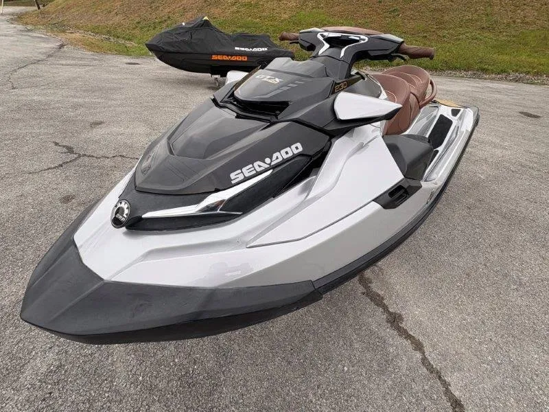 Slide: The Image of 2018 Sea-Doo GTX Limited 230 Sound jet ski on pavement. - 20