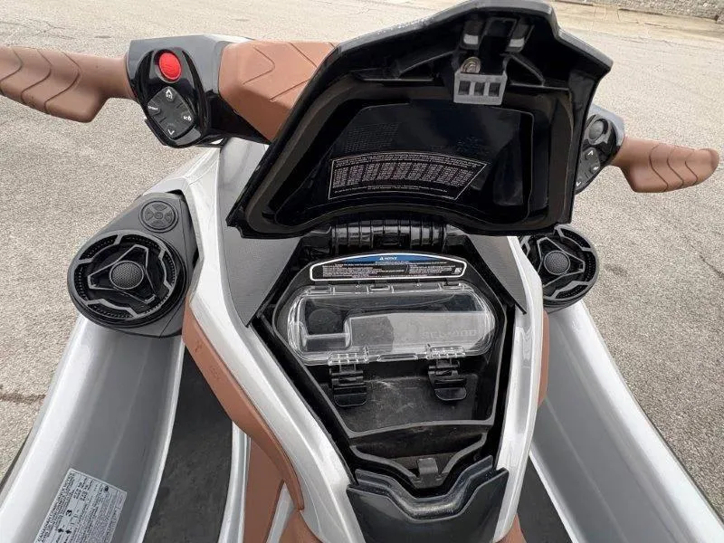 Slide: The Image of 2018 Sea-Doo GTX Limited 230 Sound, open storage compartment, brown and gray design. - 30