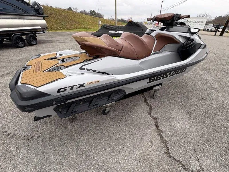 Slide: The Image of 2018 Sea-Doo GTX Limited 230 Sound jet ski on pavement. - 4