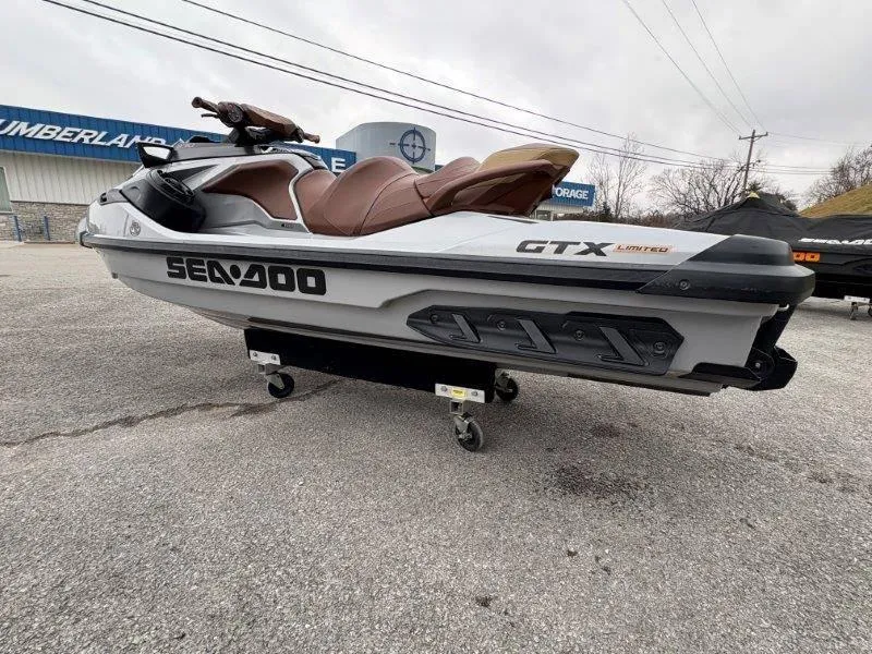 Slide: The Image of 2018 Sea-Doo GTX Limited 230 Sound jet ski on display outdoors. - 9