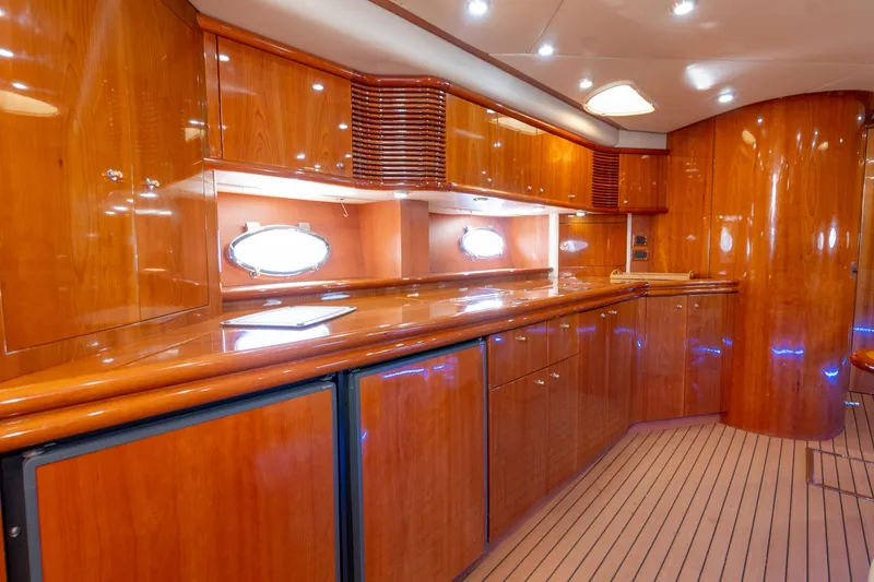 Slide: The Image of Luxurious interior of 2003 Sunseeker Predator 60 yacht with elegant wood finishes. - 6