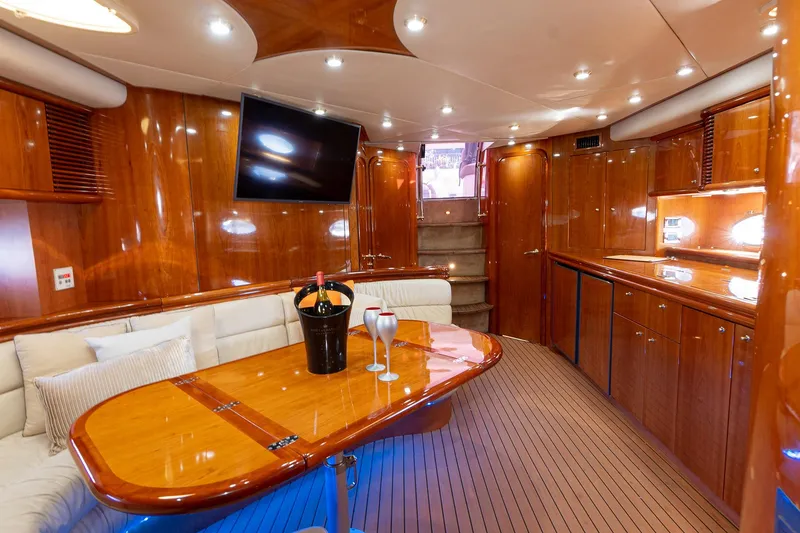 Slide: The Image of Luxurious interior of 2003 Sunseeker Predator 60 yacht with elegant wood finishes. - 7