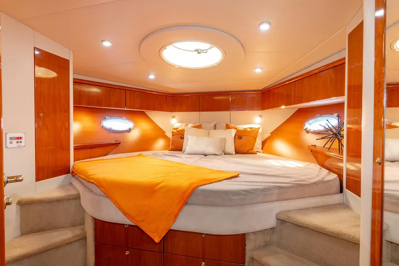 Slide: The Image of Luxurious cabin interior of 2003 Sunseeker Predator 60 yacht with elegant wood finishes. - 9