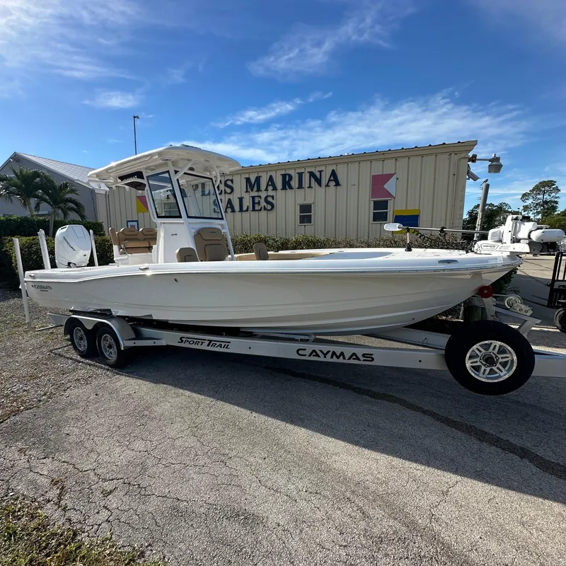 Slide: The Image of 2025 Caymas 28 HB boat on trailer at marina sales lot. - 13