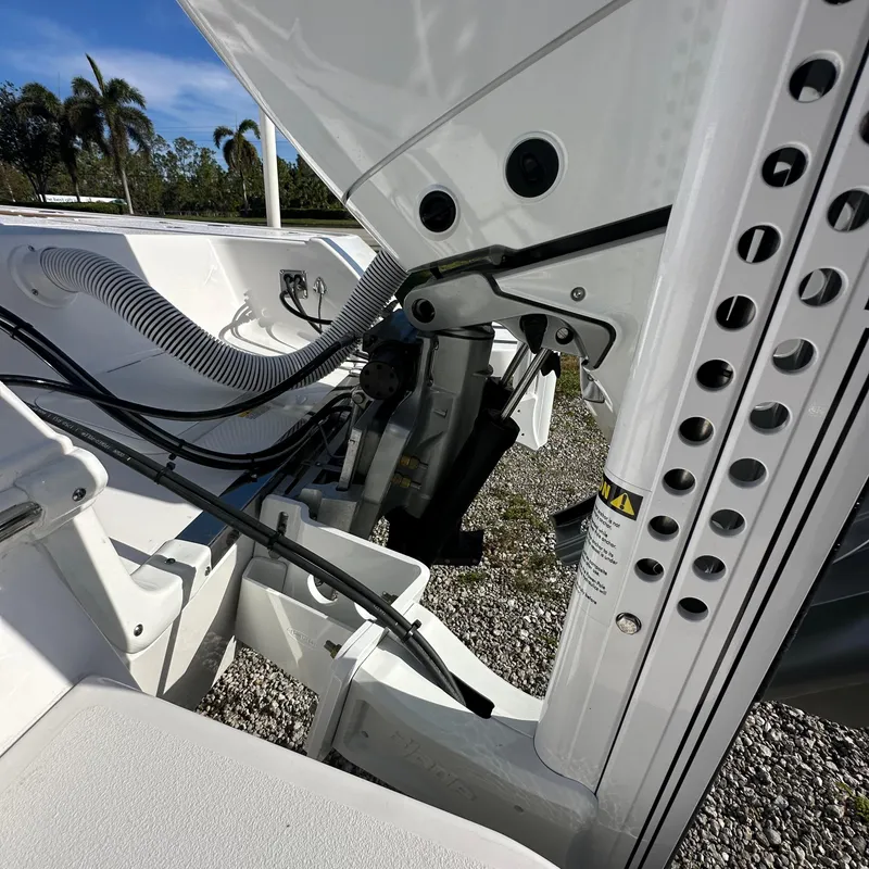 Slide: The Image of 2025 Caymas 28 HB boat interior with mechanical components and wiring. - 5