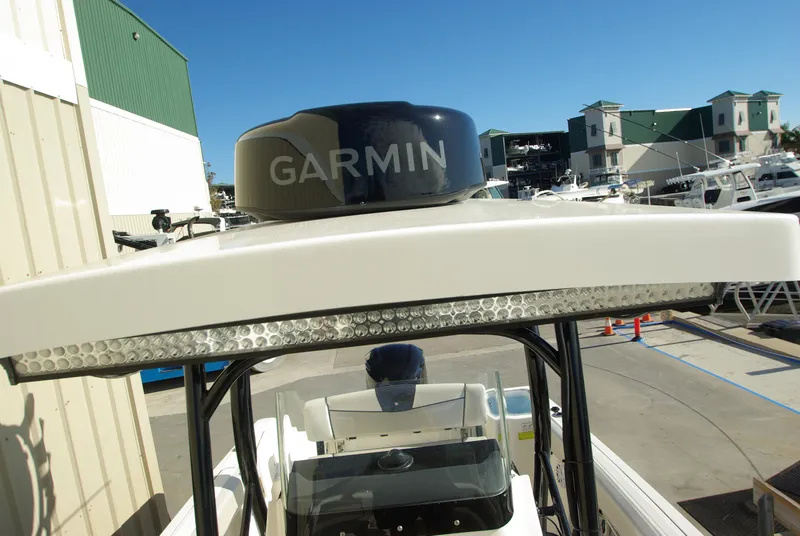 Slide: The Image of 2018 Wellcraft 222 Scarab Offshore boat with Garmin radar at marina. - 32