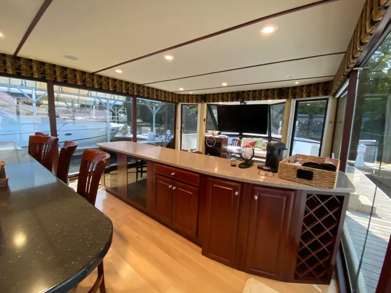 Slide: The Image of Luxurious 2005 Skipperliner Millenium yacht interior with modern kitchen and panoramic windows. - 15