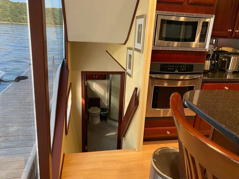 Slide: The Image of Luxurious interior of 2005 Skipperliner Millenium yacht with plush seating and large windows. - 17