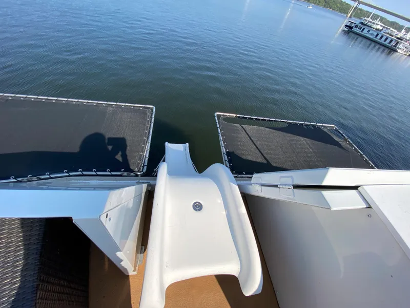 Slide: The Image of 2005 Skipperliner Millenium boat interior with open hatch and American flag. - 37