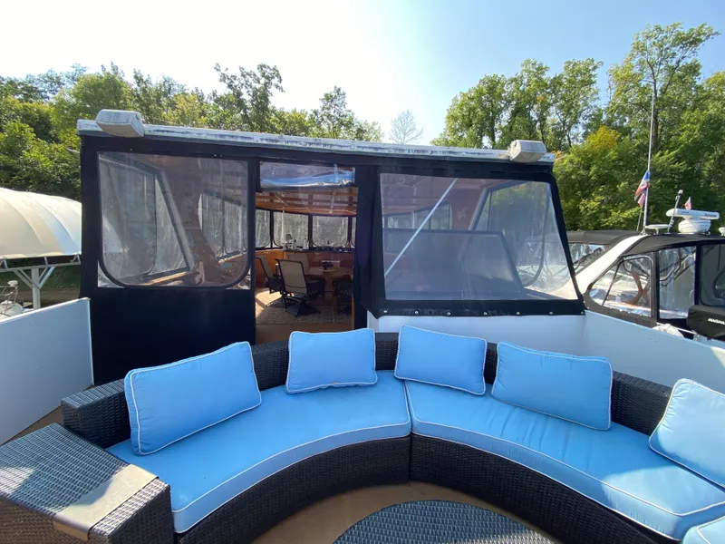 Slide: The Image of Slide on Skipperliner Millenium 2005 yacht, overlooking calm water. - 38