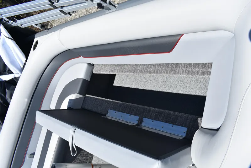 Slide: The Image of 2025 Lowe SD224 Sport Deck interior with sleek seating and modern design. - 15