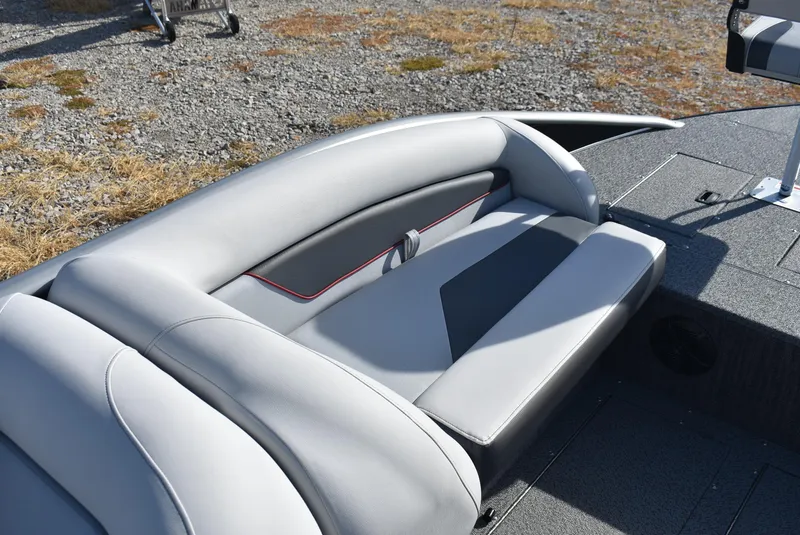 Slide: The Image of 2025 Lowe SD224 Sport Deck boat with sleek gray seating and modern design. - 17