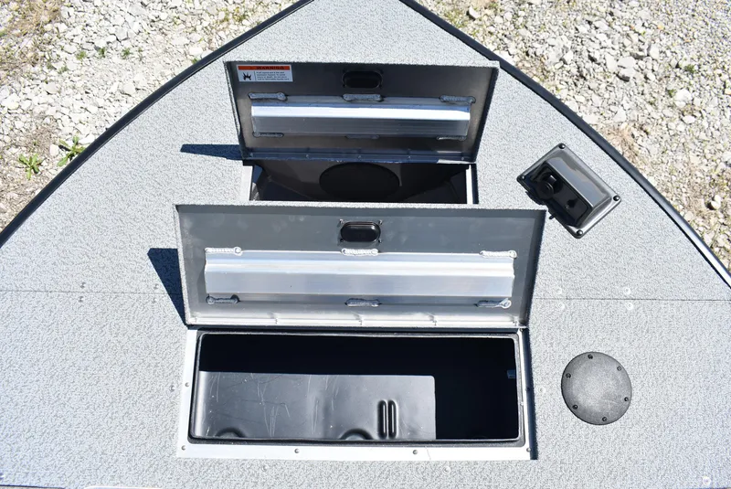 Slide: The Image of 2025 Lowe SD224 Sport Deck boat storage compartments, open on deck, showcasing ample space. - 20