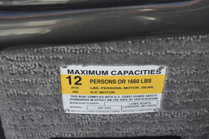 Slide: The Image of Capacity label for 2025 Lowe SD224 Sport Deck, 12 persons or 1660 lbs. - 22
