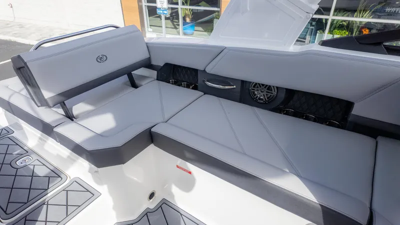 Slide: The Image of 2025 Cobalt R6 Outboard boat interior with sleek gray seating and modern design. - 20