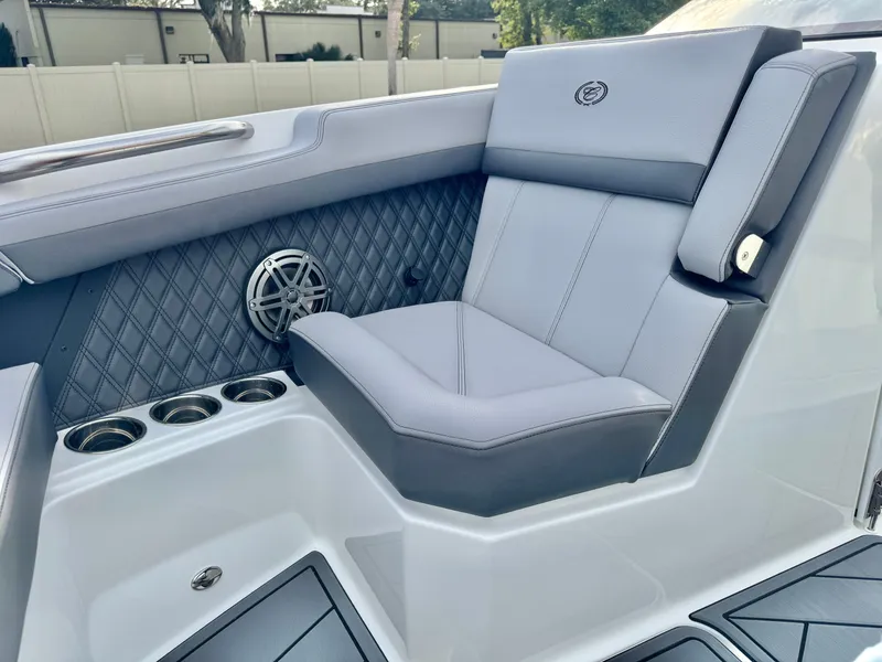 Slide: The Image of 2025 Cobalt R6 Outboard boat interior with luxurious seating and speaker system. - 21
