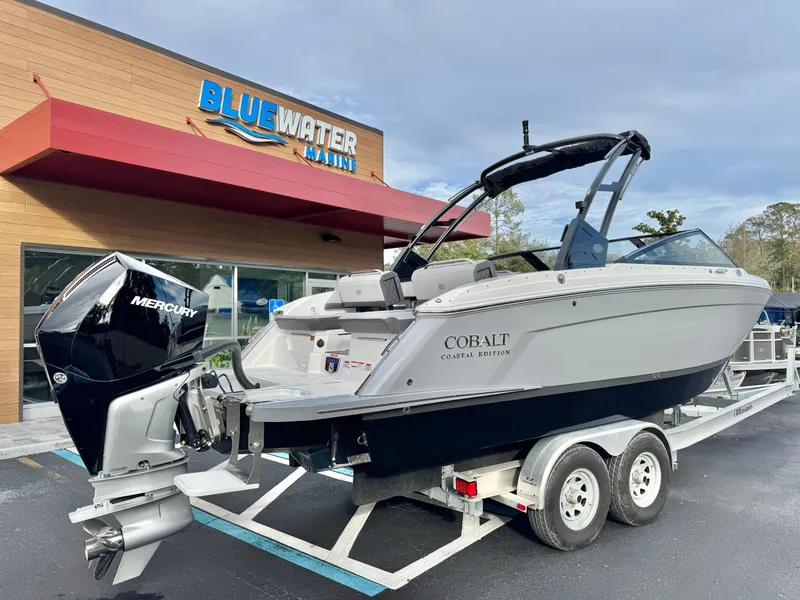 Slide: The Image of 2025 Cobalt R6 Outboard boat on trailer at Blue Water Marina. - 5