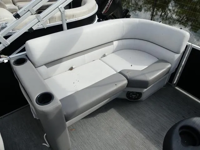 Slide: The Image of 2024 Godfrey Pontoons Sweetwater 2186 C interior seating with cup holders. - 14