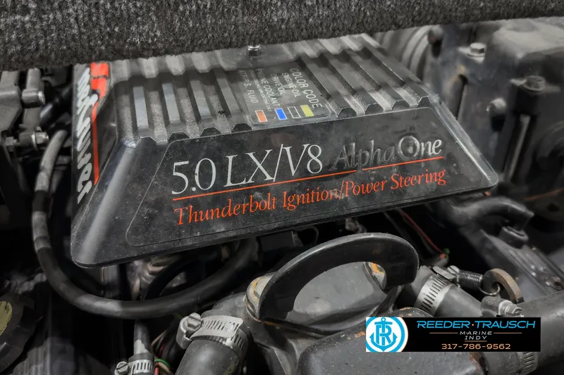 Slide: The Image of 1993 Bryant 200 engine with 5.0 LX V8, Thunderbolt Ignition, and Power Steering. - 32