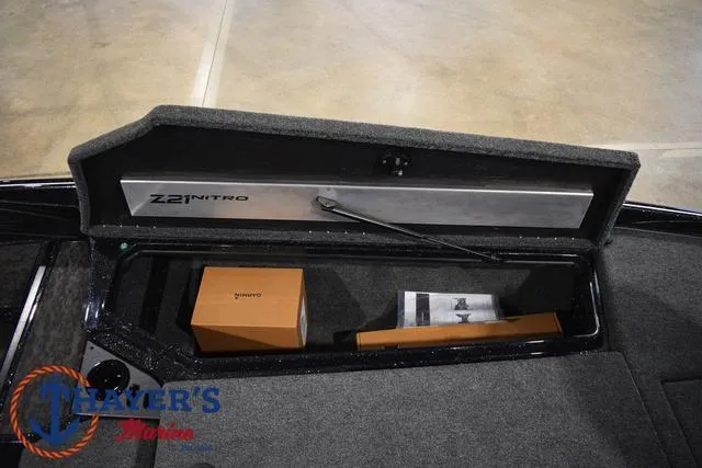 Slide: The Image of 2025 Nitro Z21 XL Pro storage compartment with boxes inside. - 18