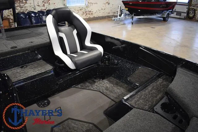 Slide: The Image of 2025 Nitro Z21 XL Pro boat interior with sleek seating and spacious layout. - 23