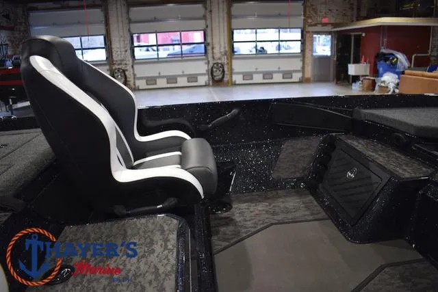 Slide: The Image of 2025 Nitro Z21 XL Pro boat interior with sleek seating and modern design. - 24