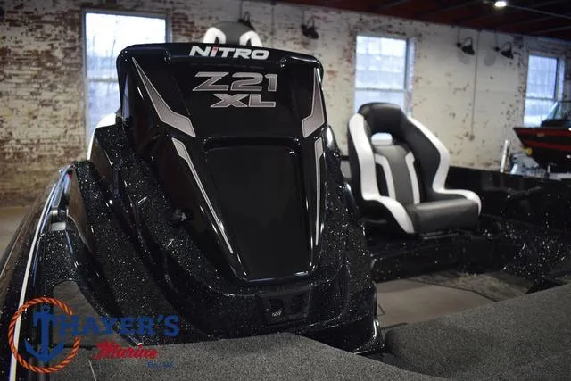 Slide: The Image of 2025 Nitro Z21 XL Pro boat interior with sleek black design and comfortable seating. - 27