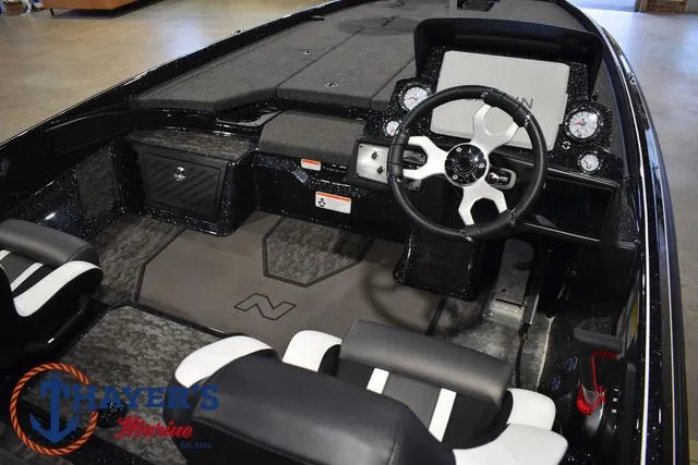 Slide: The Image of 2025 Nitro Z21 XL Pro boat interior with steering wheel and dashboard. - 30