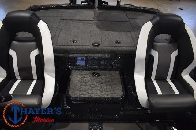 Slide: The Image of 2025 Nitro Z21 XL Pro boat interior with dual black and white seats. - 34