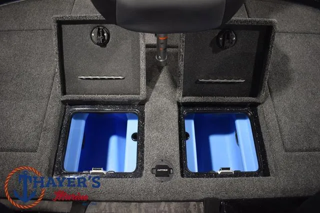 Slide: The Image of 2025 Nitro Z21 XL Pro boat storage compartments with blue interior. - 41