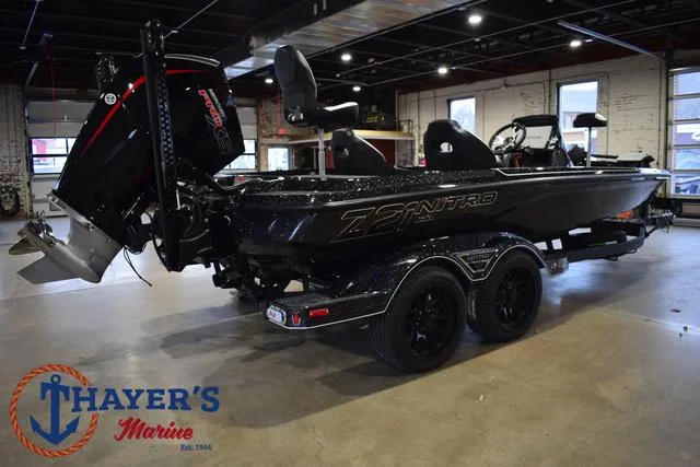 Slide: The Image of 2025 Nitro Z21 XL Pro boat in showroom, featuring sleek design and powerful engine. - 44
