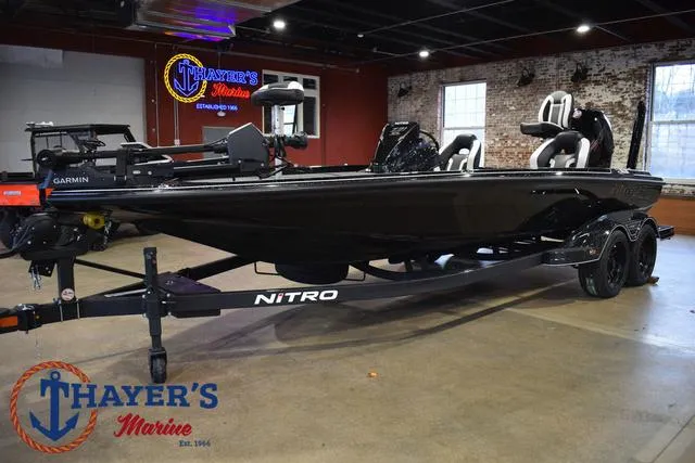 Slide: The Image of 2025 Nitro Z21 XL Pro boat displayed at Thayer's Marine showroom. - 8