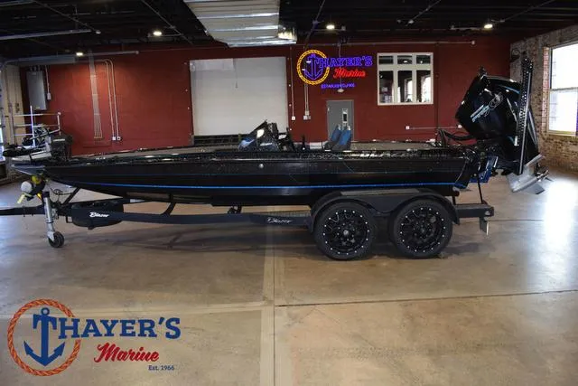 Slide: The Image of 2023 Blazer 625 Pro Elite boat on trailer at Thayer's Marine showroom. - 12