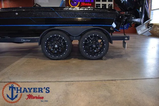 Slide: The Image of 2023 Blazer 625 Pro Elite boat trailer at Thayer's Marine showroom. - 13