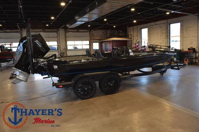 Slide: The Image of 2023 Blazer 625 Pro Elite boat in showroom at Thayer's Marine. - 2