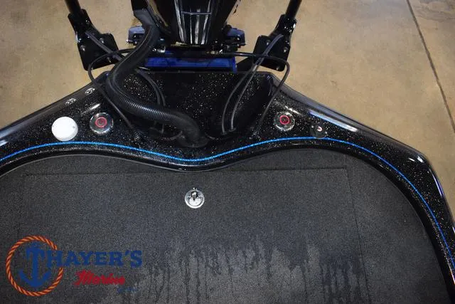 Slide: The Image of 2023 Blazer 625 Pro Elite boat deck with control panel and logo. - 20