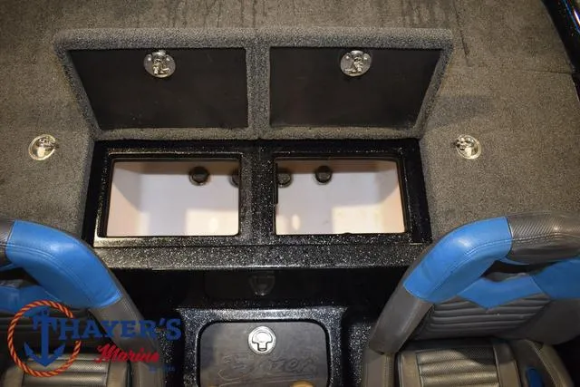 Slide: The Image of 2023 Blazer 625 Pro Elite boat interior with storage compartments and seating. - 23