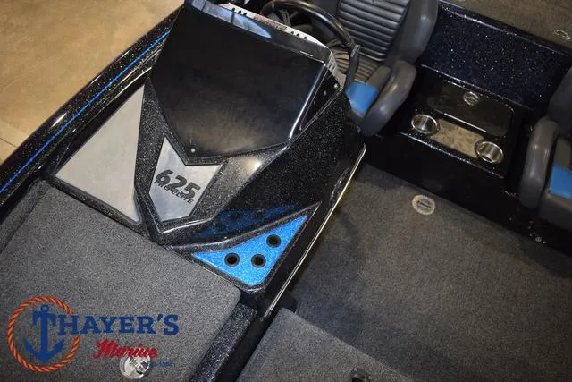 Slide: The Image of 2023 Blazer 625 Pro Elite boat interior with Thayer's Marine logo. - 31