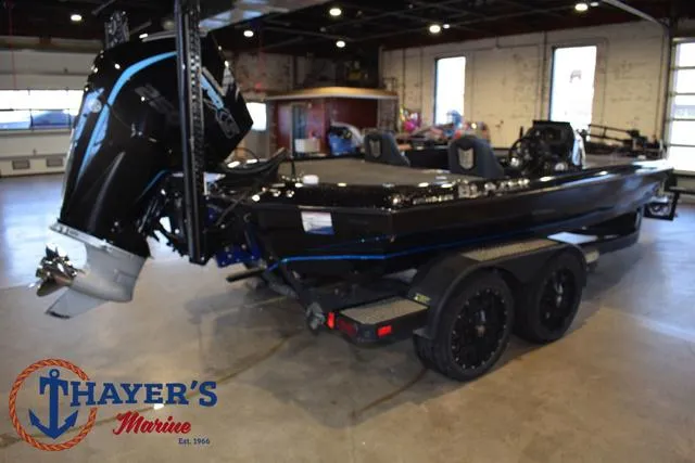 Slide: The Image of 2023 Blazer 625 Pro Elite boat in showroom at Thayer's Marine. - 34