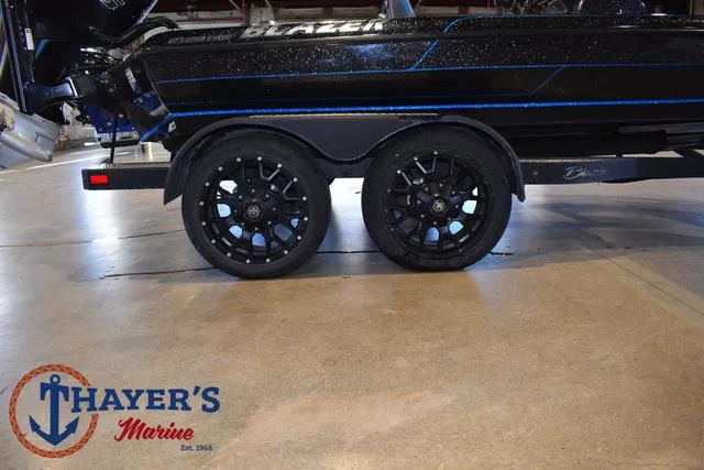 Slide: The Image of 2023 Blazer 625 Pro Elite boat trailer with black wheels at Thayer's Marine. - 5