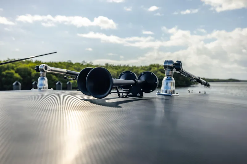 Slide: The Image of Close-up of Marlago 35 boat equipment on deck, 2005 model, with scenic water view. - 16