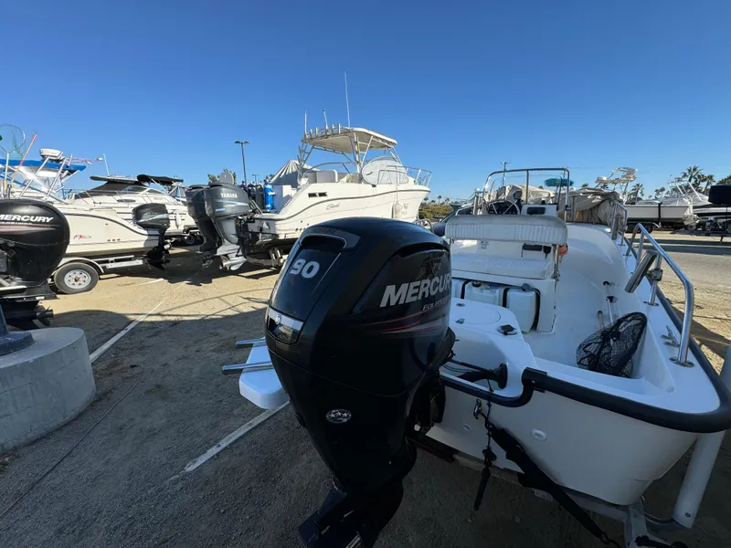 Slide: The Image of 2016 Boston Whaler 170 MONTUCK with Mercury engine in a boatyard. - 12