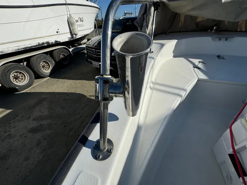 Slide: The Image of 2016 Boston Whaler 170 MONTUCK boat interior with stainless steel rod holder. - 23
