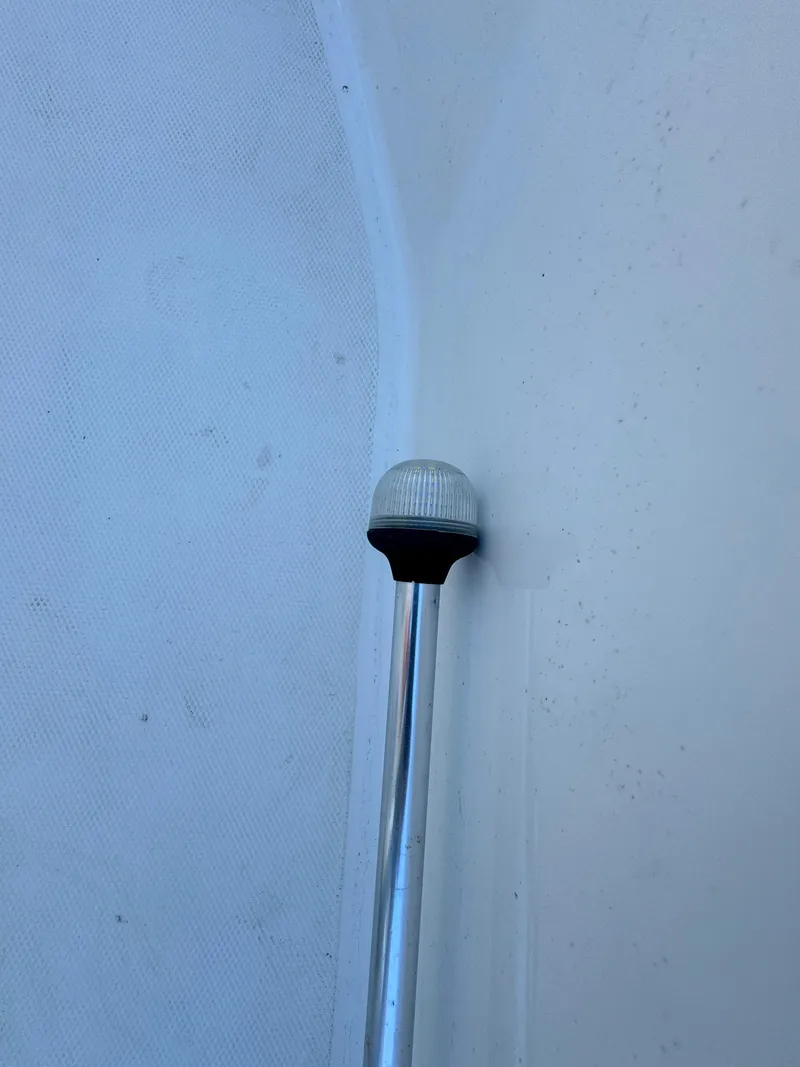 Slide: The Image of Navigation light on a 2016 Boston Whaler 170 MONTUCK boat. - 26