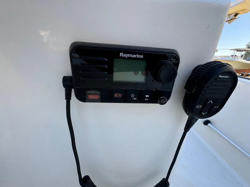 Slide: The Image of Raymarine marine radio on 2016 Boston Whaler 170 MONTUCK boat dashboard. - 34
