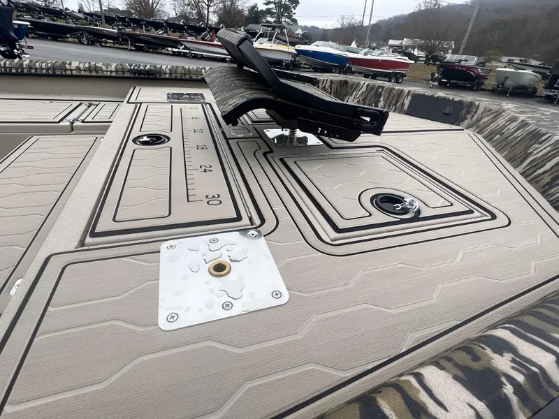 Slide: The Image of 2025 Avid 18 Commander boat deck with seating and measurement markings. - 5