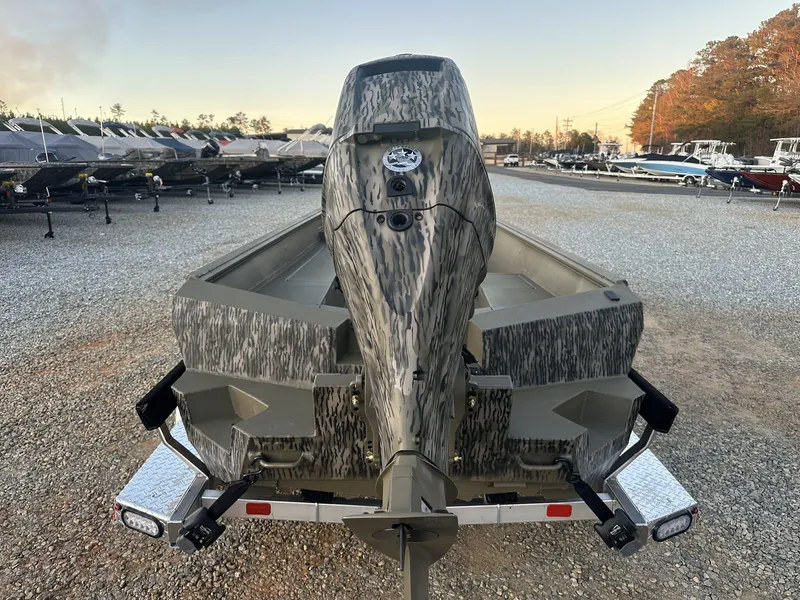 Slide: The Image of 2025 Thor Lake Hammer 1754 with Tohatsu 60 engine, parked on gravel lot. - 12