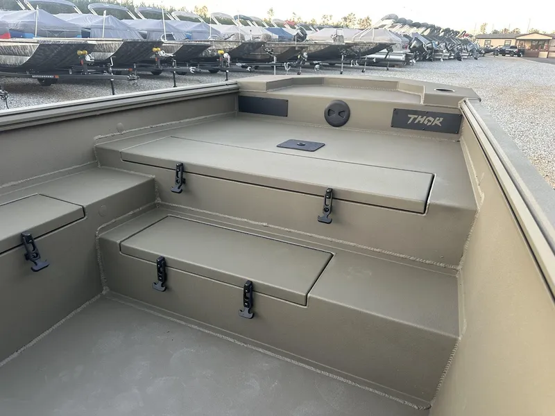 Slide: The Image of 2025 Thor Lake Hammer 1754 boat interior with storage compartments. - 13