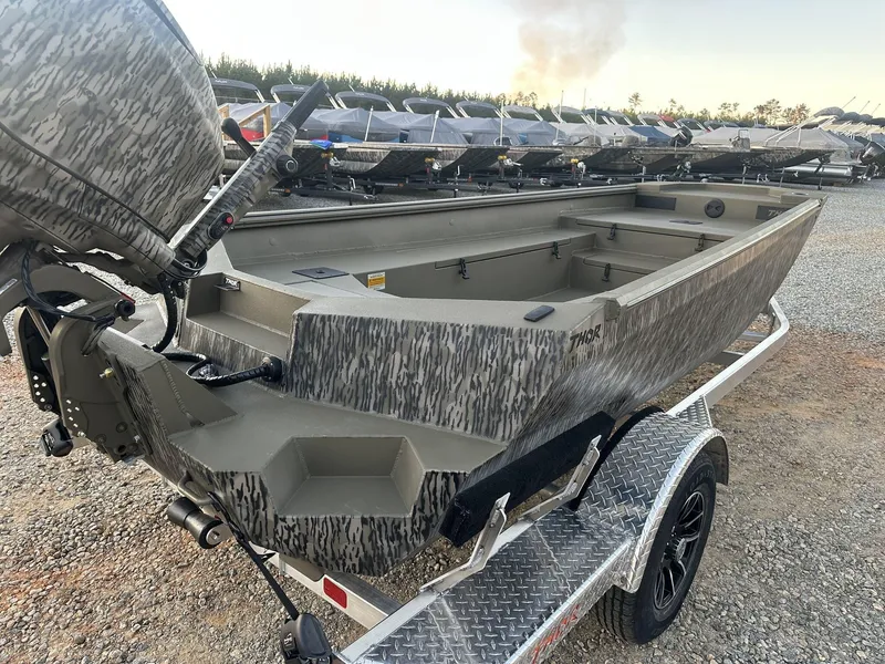 Slide: The Image of 2025 Thor Lake Hammer 1754 boat with Tohatsu 60 engine on a trailer. - 7